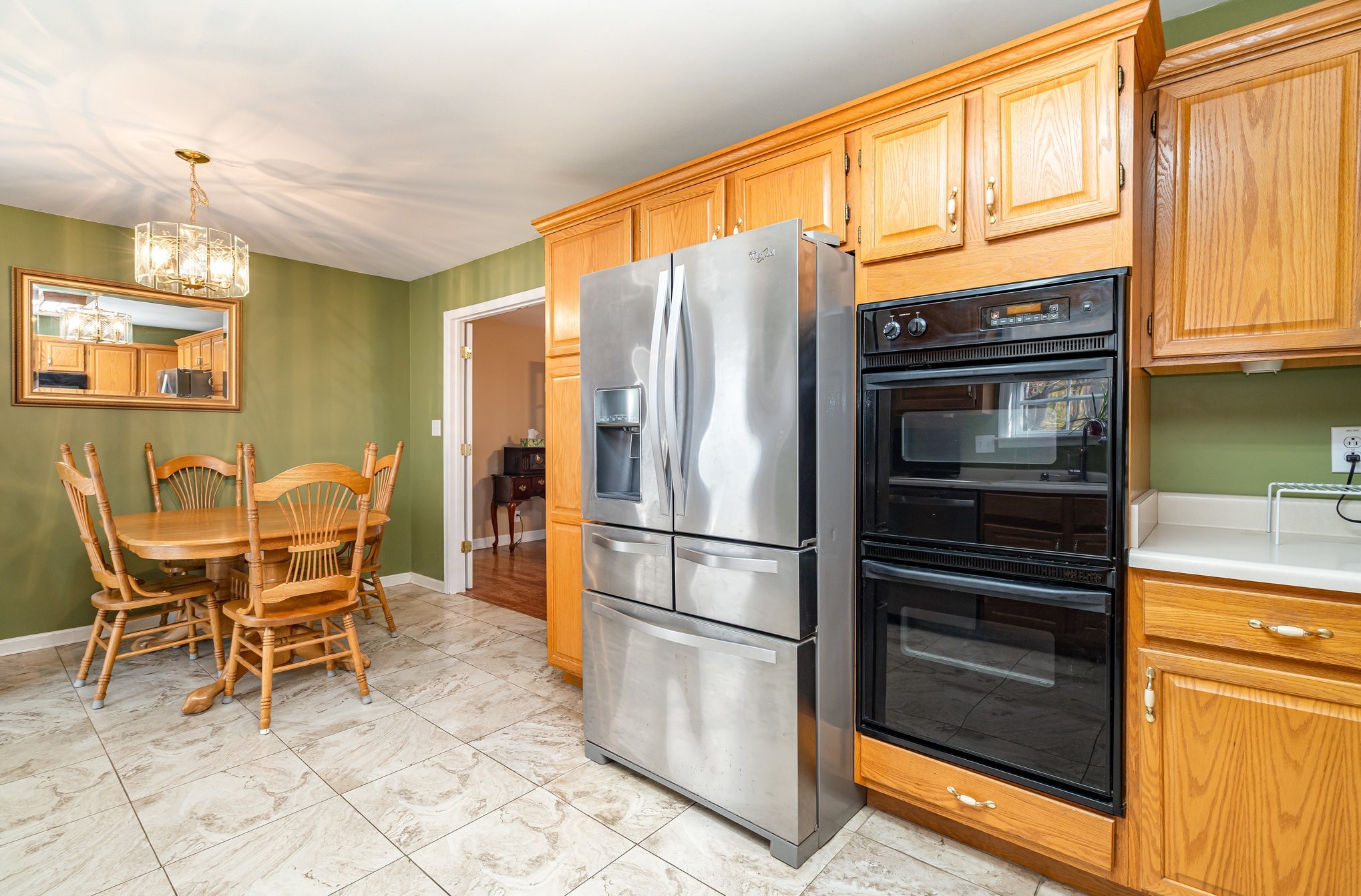 5221 Grand View Lane Pleasant View, TN 37146 - Photo 11 of 37 a kitchen with stainless steel appliances granite countertop a refrigerator and a stove top oven