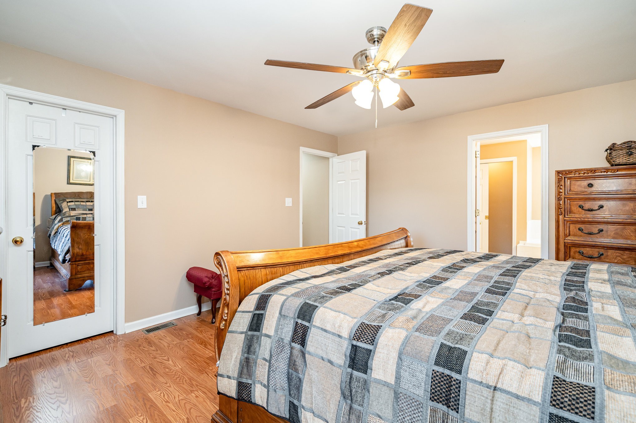5221 Grand View Lane Pleasant View, TN 37146 - Photo 16 of 37 a bedroom with a bed and wooden floor