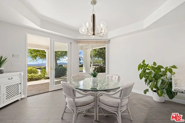 a view of workspace with window and outdoor seating