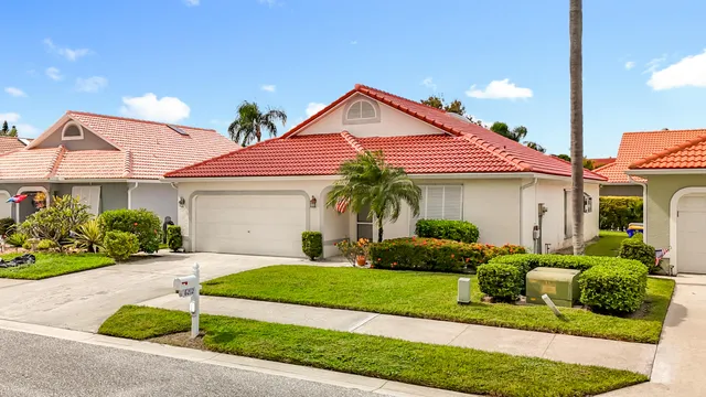 a dining room with furniture window and outside view