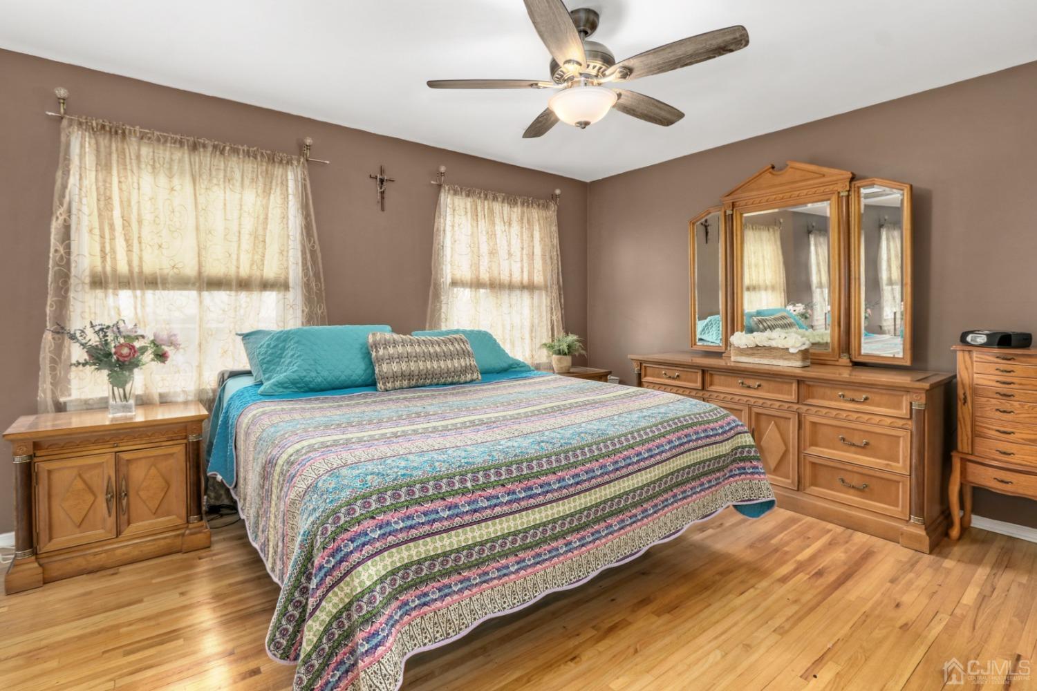 165 Howell Avenue Fords, NJ 08863 - Photo 16 of 31 a bedroom with a bed dresser and a window