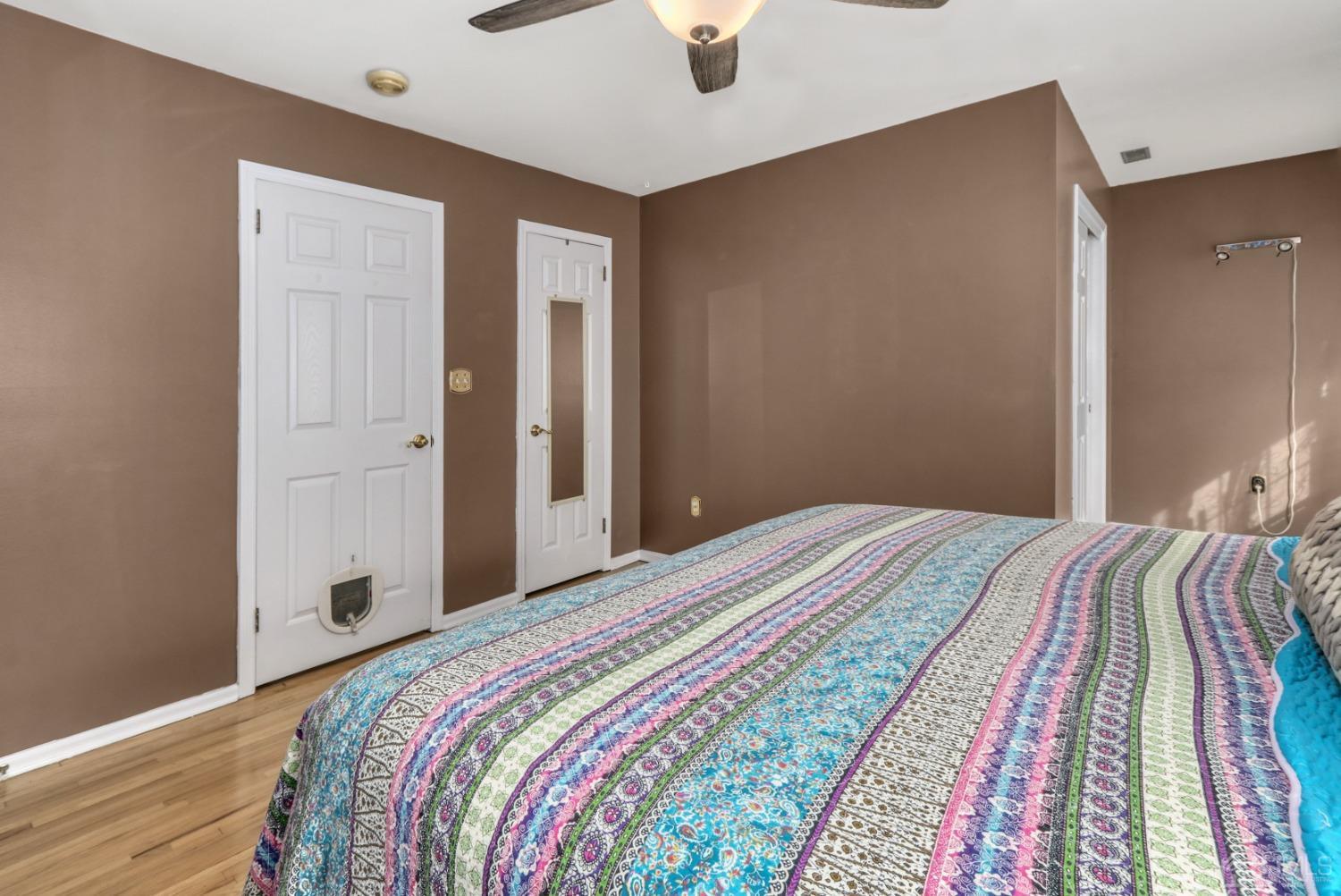 165 Howell Avenue Fords, NJ 08863 - Photo 17 of 31 a bedroom with a bed and painting on the wall