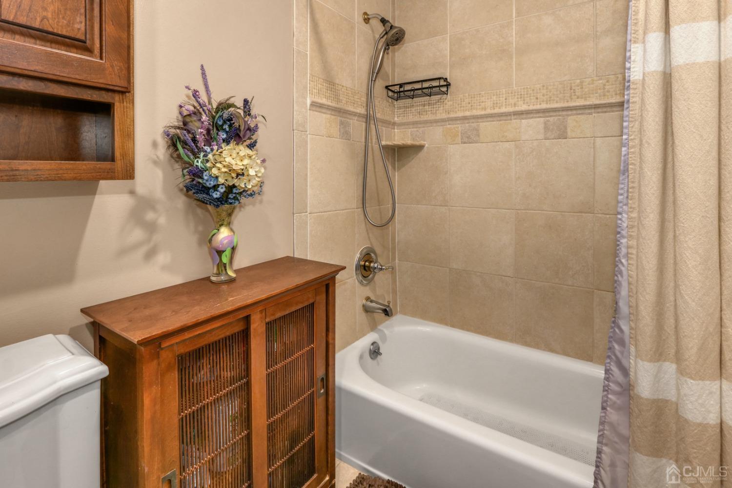 165 Howell Avenue Fords, NJ 08863 - Photo 19 of 31 a bath room with a sink and a bath tub