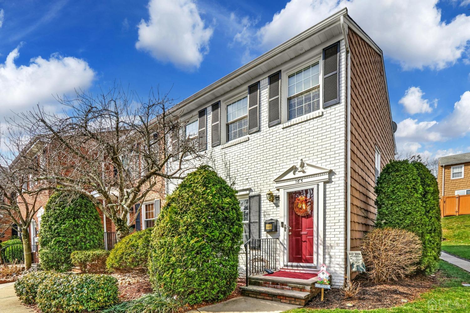 165 Howell Avenue Fords, NJ 08863 - Photo 2 of 31 a front view of a house with garden