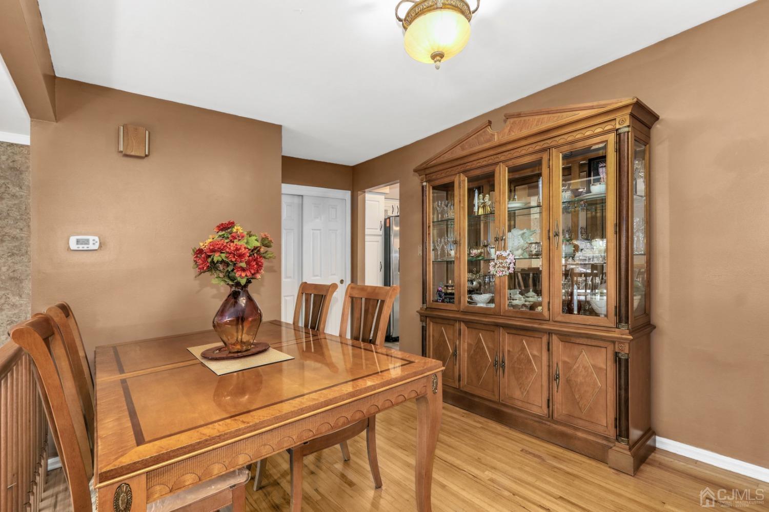 165 Howell Avenue Fords, NJ 08863 - Photo 6 of 31 a view of a dining room with furniture and wooden floor