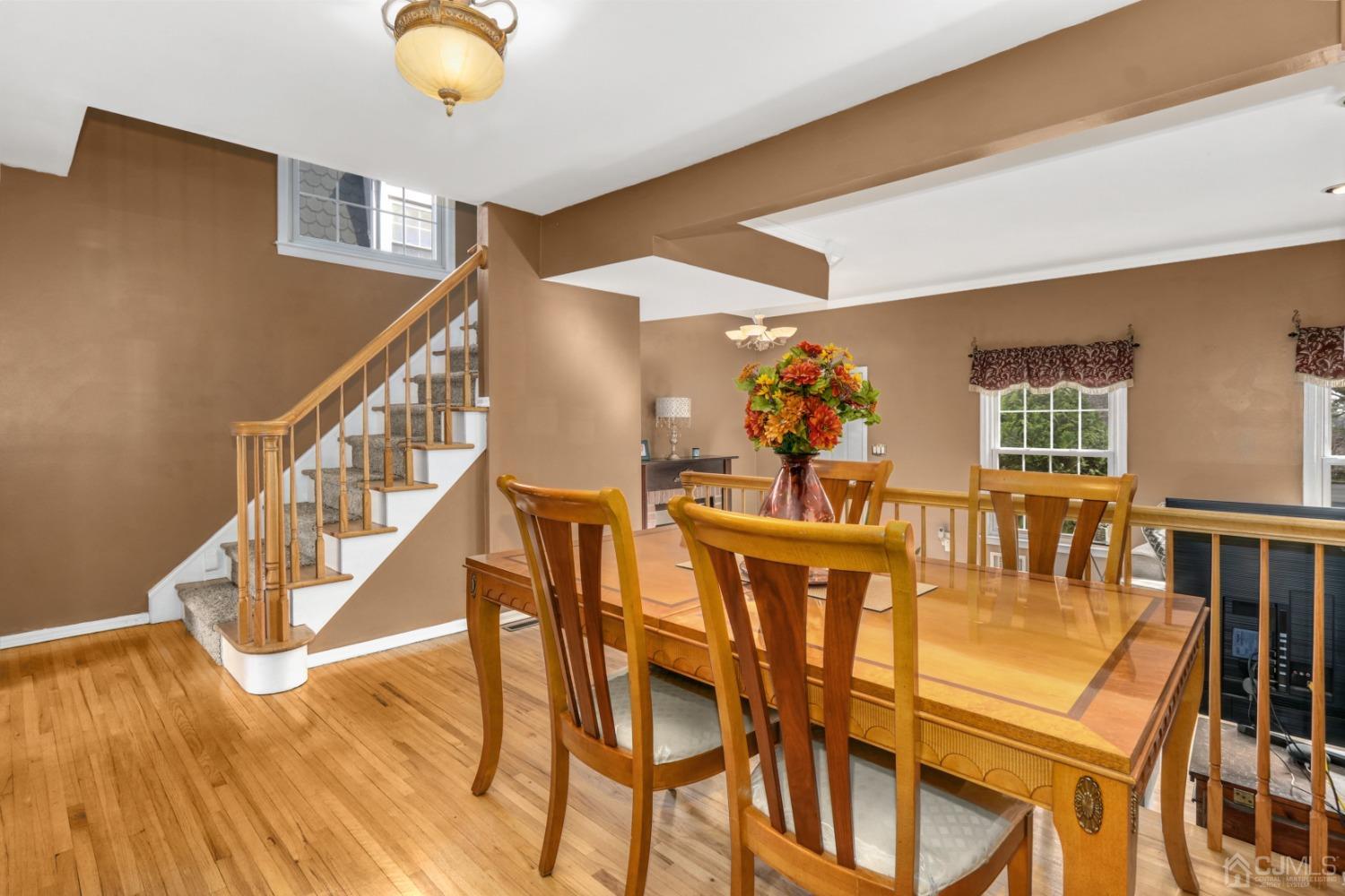 165 Howell Avenue Fords, NJ 08863 - Photo 8 of 31 a view of a livingroom with furniture wooden floor and windows