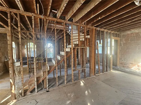 a view of entryway with wooden walls