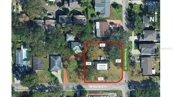 an aerial view of houses and roads