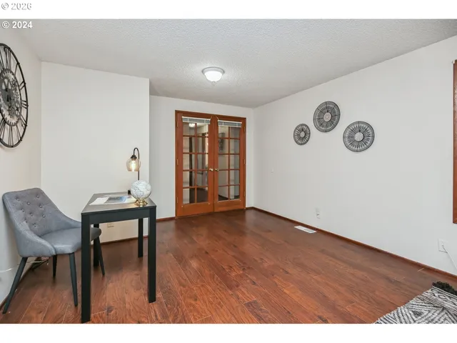 a view of livingroom with furniture and wooden floor