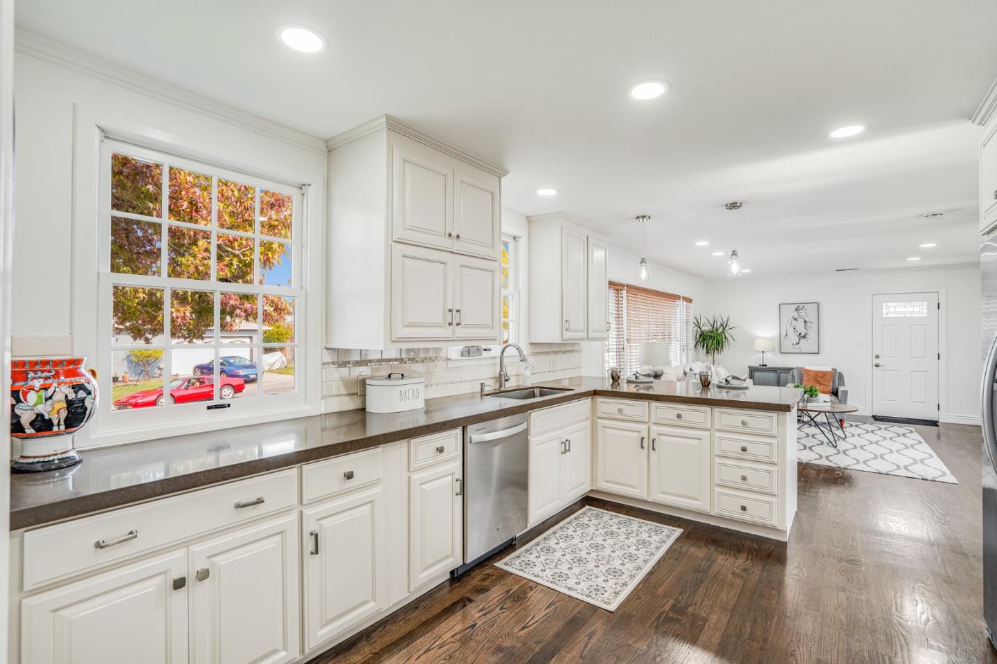 100 Chestnut Street San Carlos, CA 94070 - Photo 12 of 45 a kitchen with a sink stove and cabinets