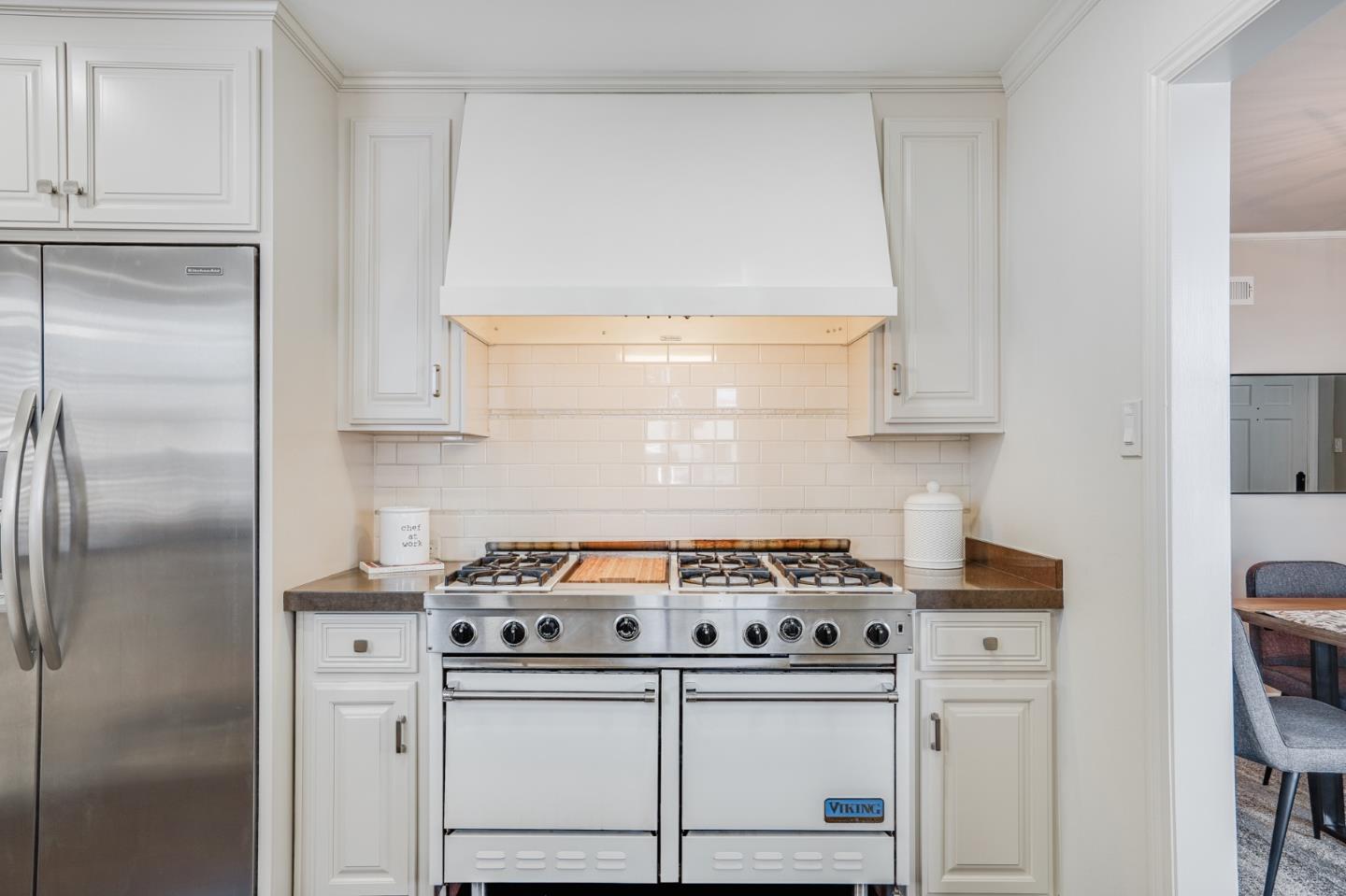 100 Chestnut Street San Carlos, CA 94070 - Photo 15 of 45 a white stove top oven sitting inside of a kitchen