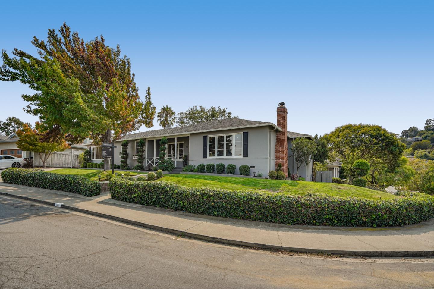 100 Chestnut Street San Carlos, CA 94070 - Photo 2 of 45 a front view of a house with a yard