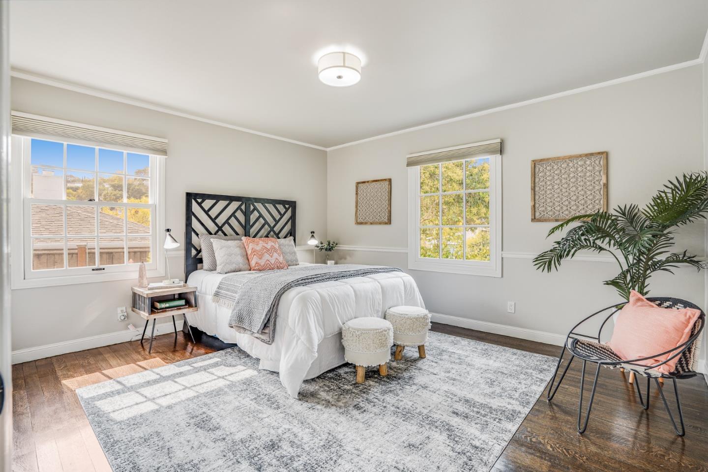 100 Chestnut Street San Carlos, CA 94070 - Photo 24 of 45 a bedroom with a bed and a chair with the potted plant