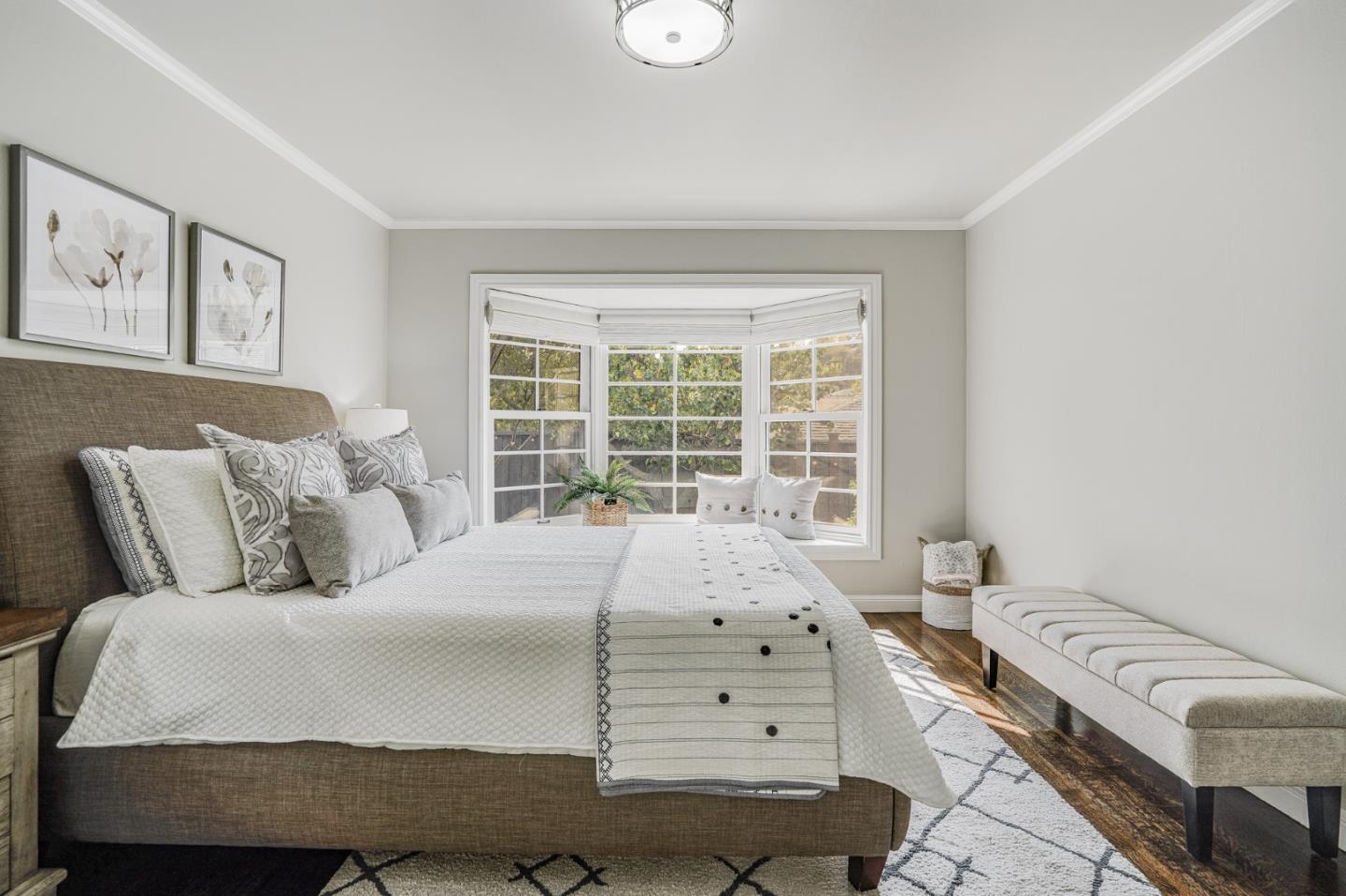 100 Chestnut Street San Carlos, CA 94070 - Photo 30 of 45 a bedroom with a bed and a window