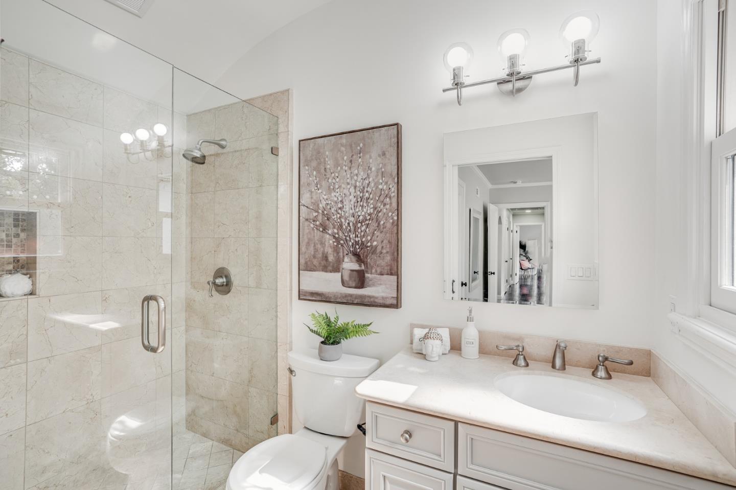 100 Chestnut Street San Carlos, CA 94070 - Photo 31 of 45 a bathroom with a sink shower and a mirror