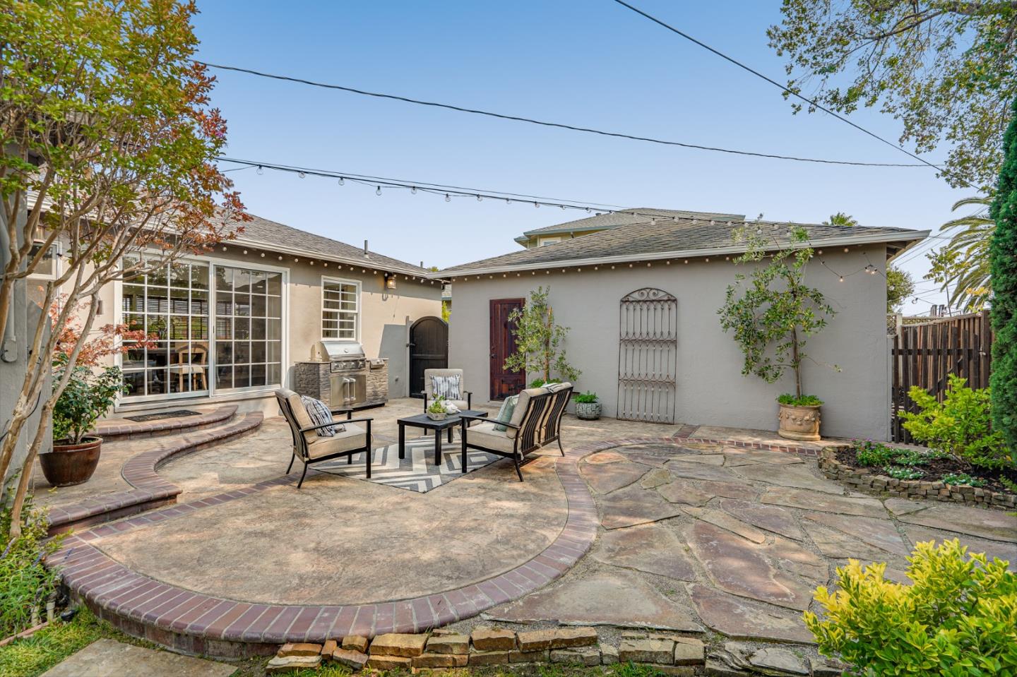 100 Chestnut Street San Carlos, CA 94070 - Photo 34 of 45 a view of a house with backyard porch and sitting area