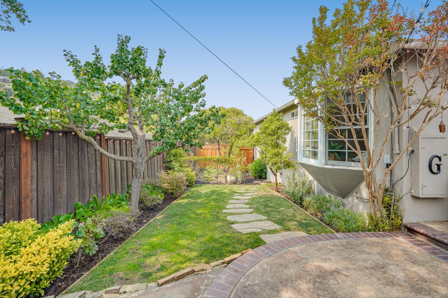 100 Chestnut Street San Carlos, CA 94070 - Photo 35 of 45 a front view of a house with garden