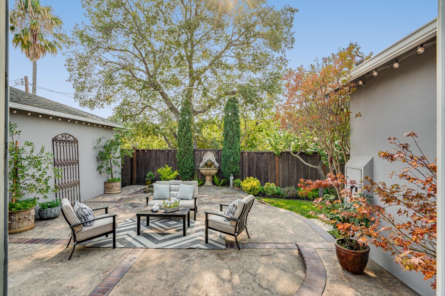 100 Chestnut Street San Carlos, CA 94070 - Photo 37 of 45 a view of backyard with outdoor seating and plants