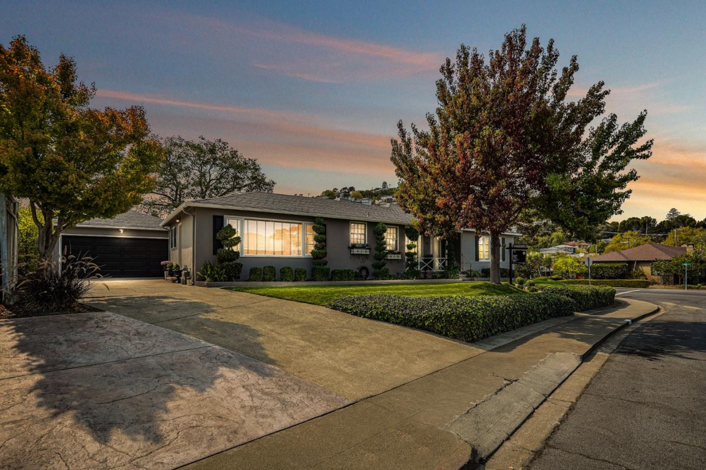 100 Chestnut Street San Carlos, CA 94070 - Photo 45 of 45 a front view of a house with a yard and garage