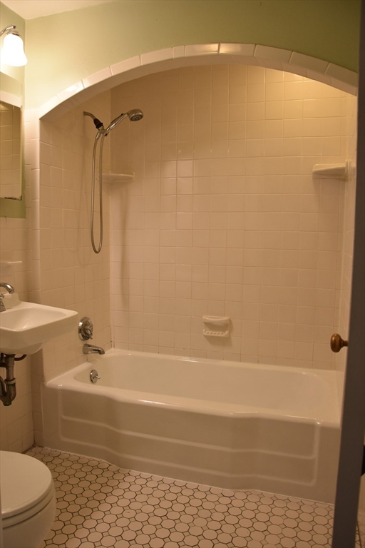 134 Fuller Street, Unit 3 Brookline, MA 02446 - Photo 8 of 8 a bathroom with a shower a toilet and a sink