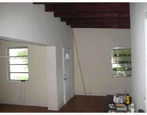a kitchen with a sink and a stove