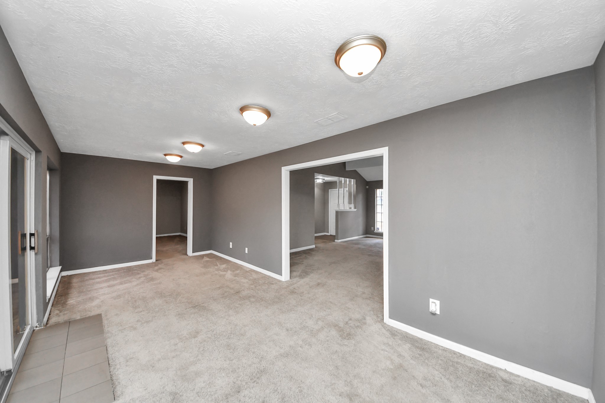 411 Dover Lane Spring, TX 77373 - Photo 22 of 40 an empty room with windows and closet