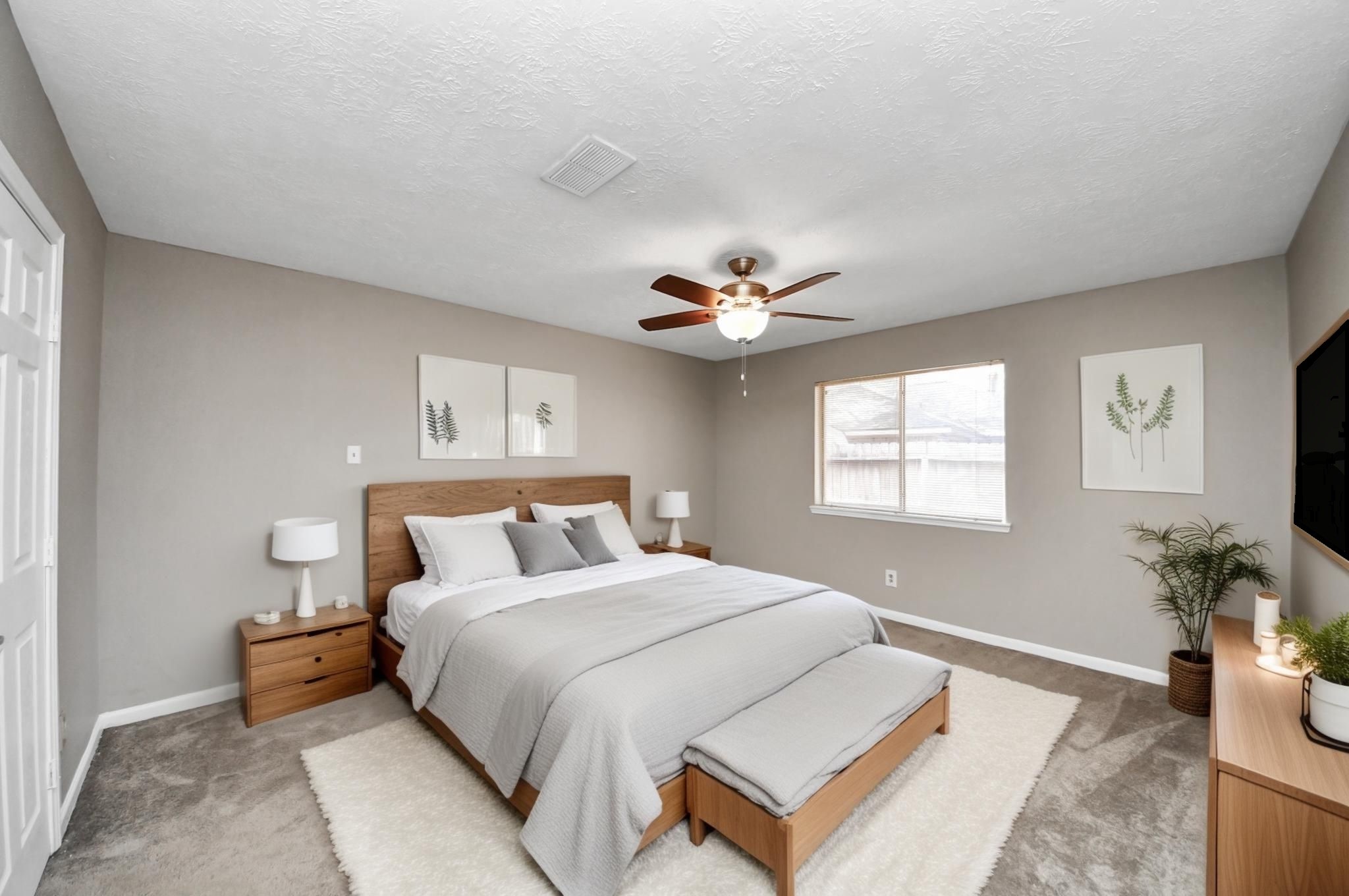 411 Dover Lane Spring, TX 77373 - Photo 26 of 40 a bedroom with a bed and window