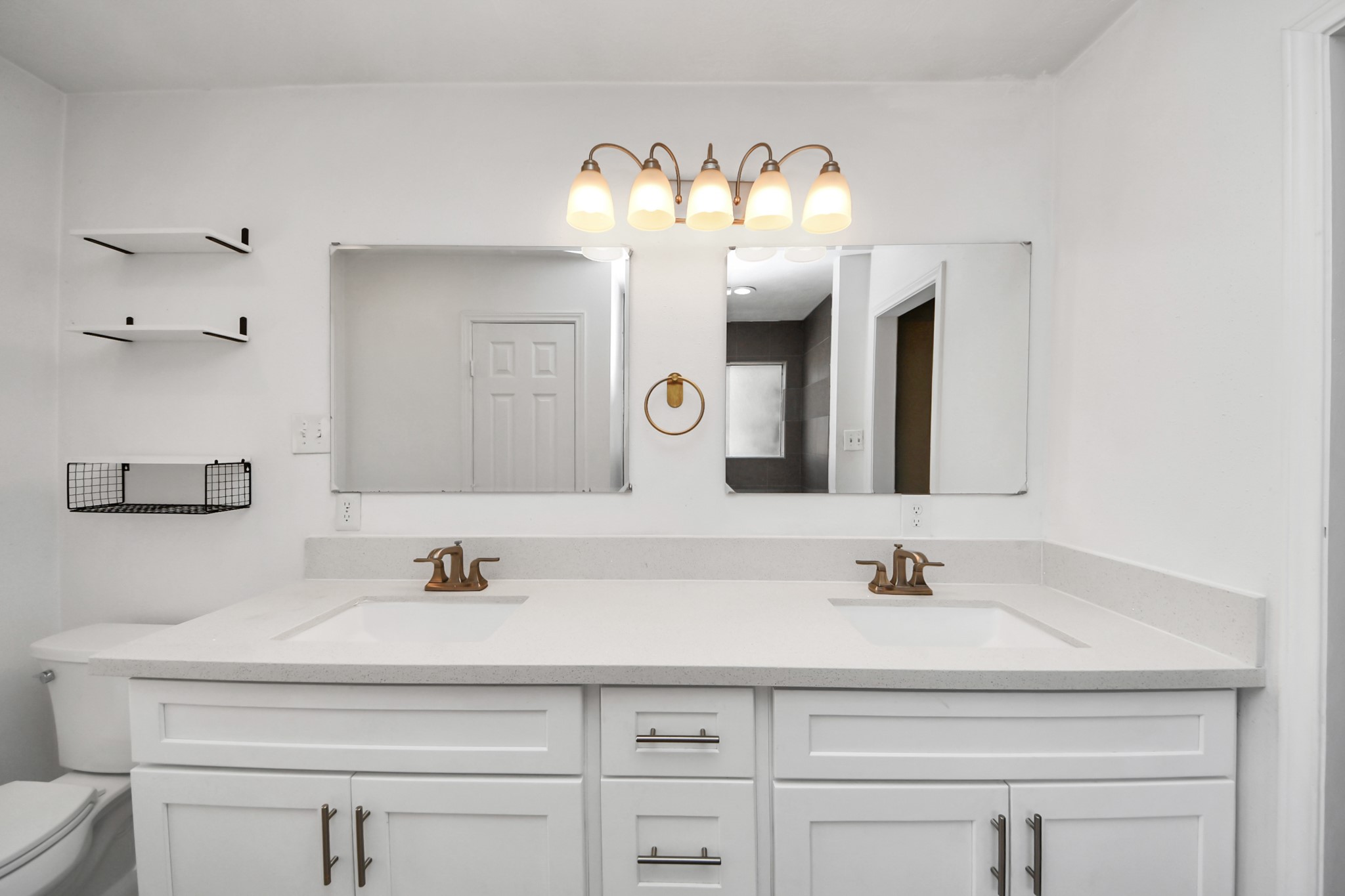 411 Dover Lane Spring, TX 77373 - Photo 30 of 40 a bathroom with a sink and a mirror