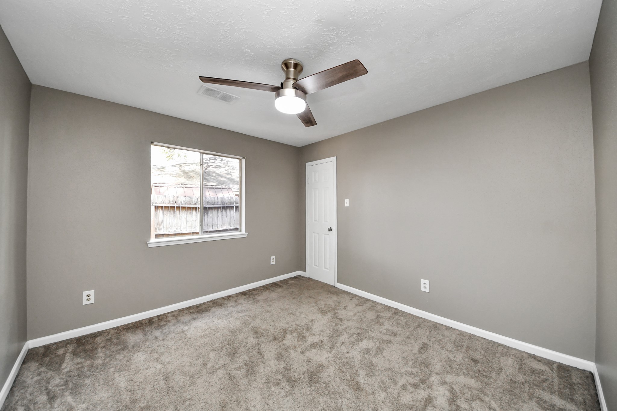 411 Dover Lane Spring, TX 77373 - Photo 35 of 40 a view of an empty room with a window