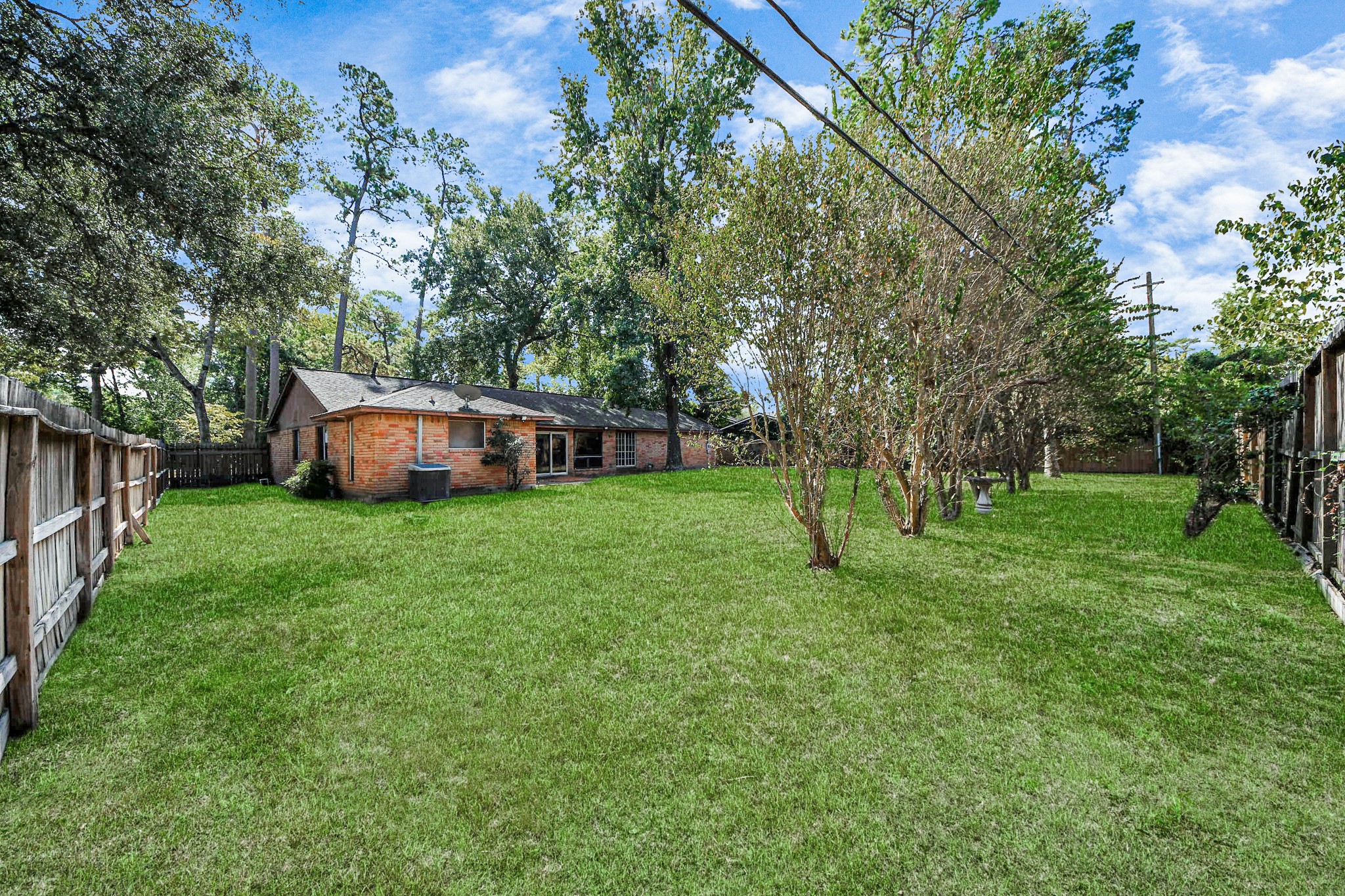 411 Dover Lane Spring, TX 77373 - Photo 39 of 40 a view of a house with backyard