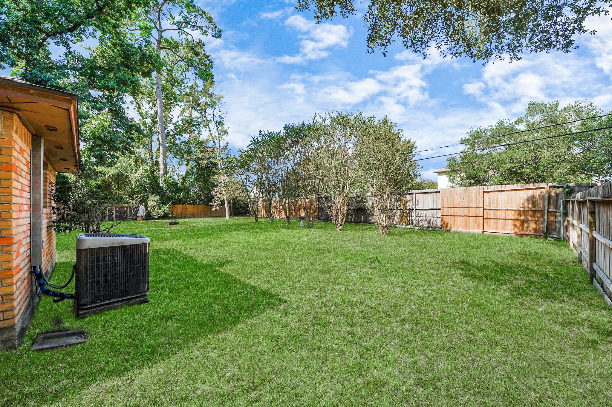 411 Dover Lane Spring, TX 77373 - Photo 40 of 40 a view of yard with trampoline