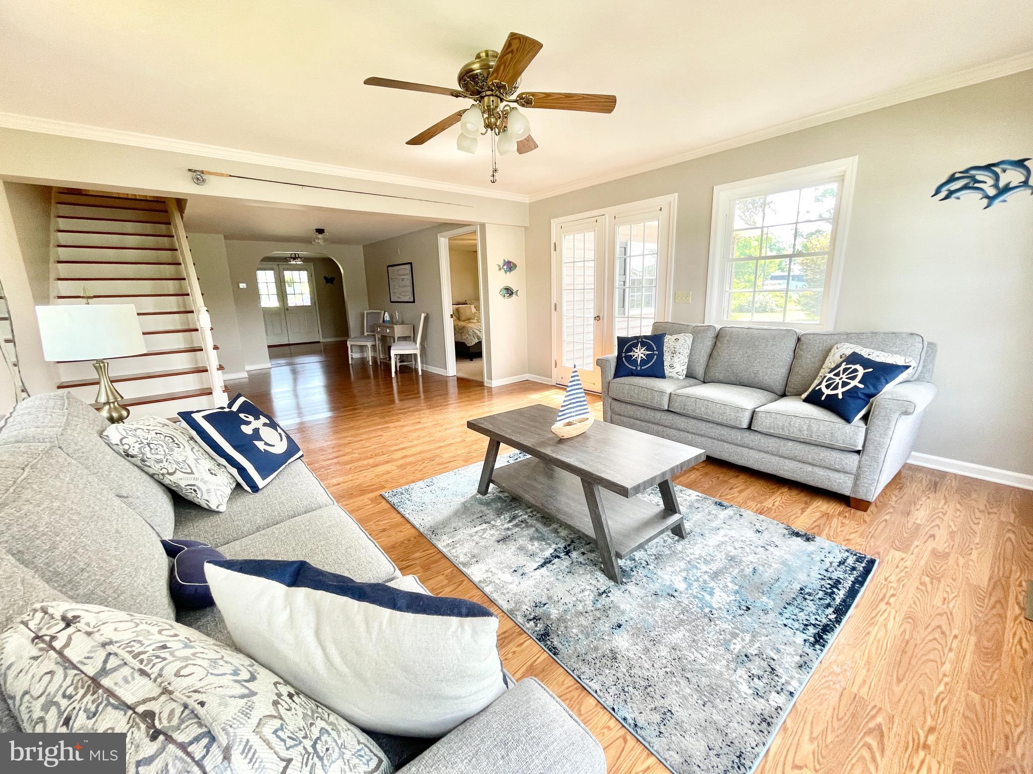 308 Apple Tree Road Montross, VA 22520 - Photo 15 of 55 a living room with furniture and a rug