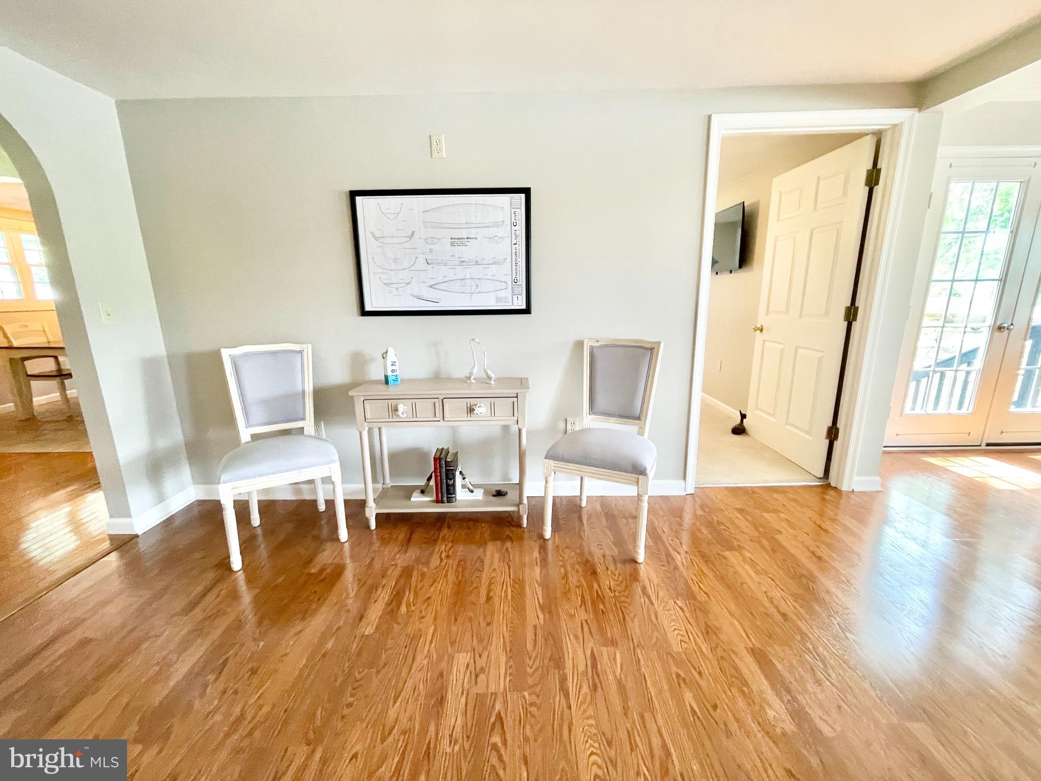 308 Apple Tree Road Montross, VA 22520 - Photo 17 of 55 a living room with furniture and a wooden floor