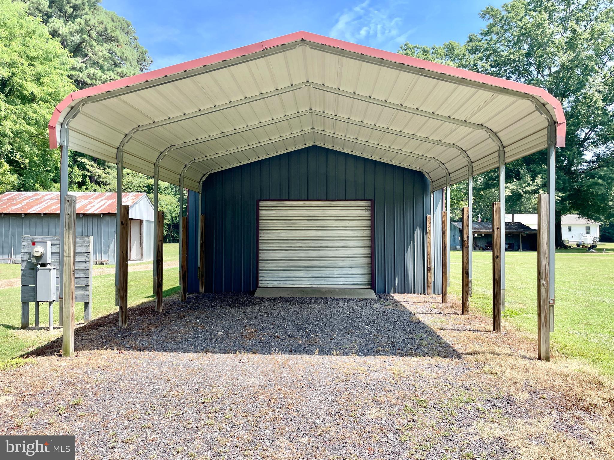 308 Apple Tree Road Montross, VA 22520 - Photo 36 of 55 a front view of a house with a yard