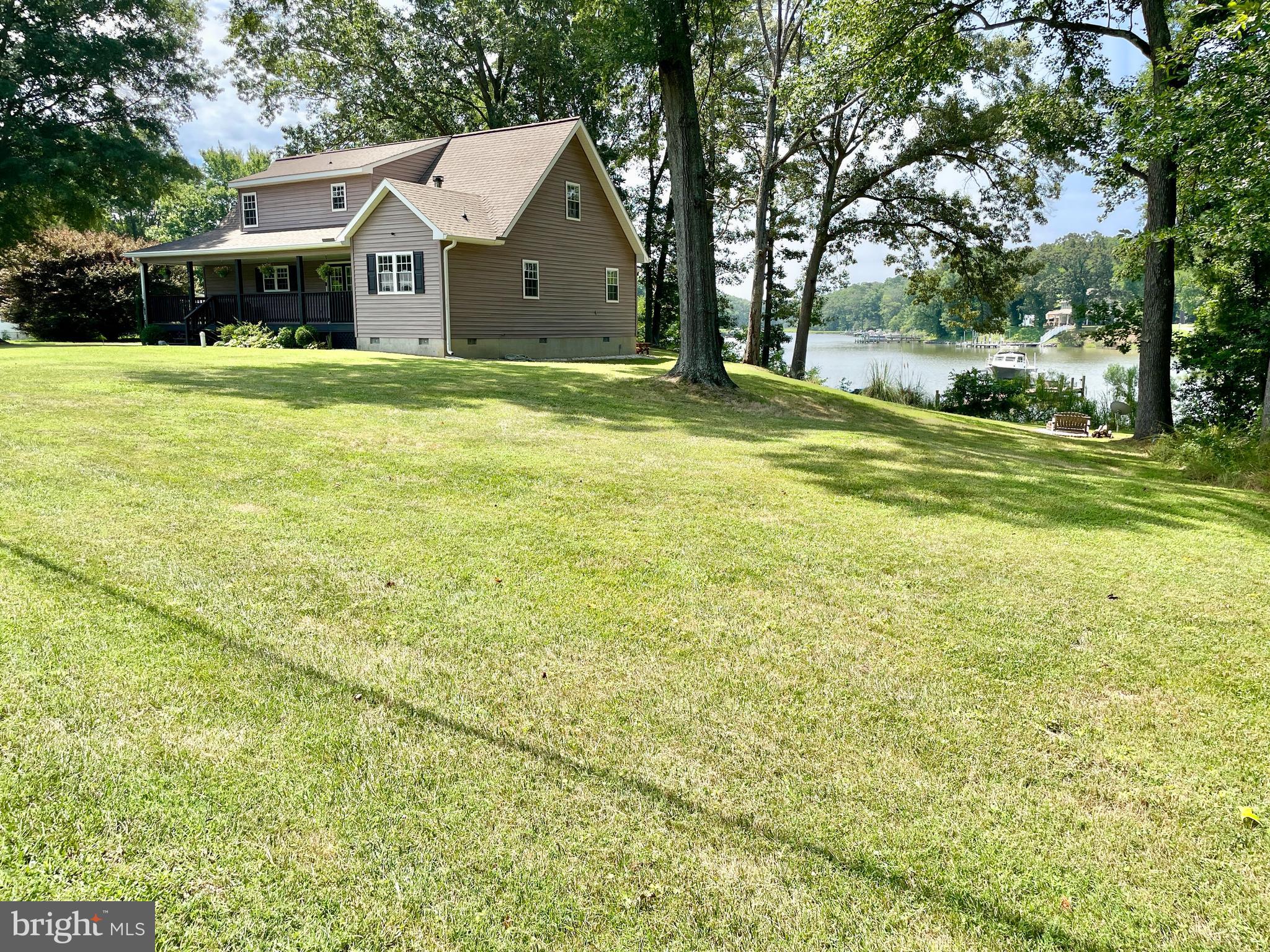 308 Apple Tree Road Montross, VA 22520 - Photo 38 of 55 a front view of house with yard and green space