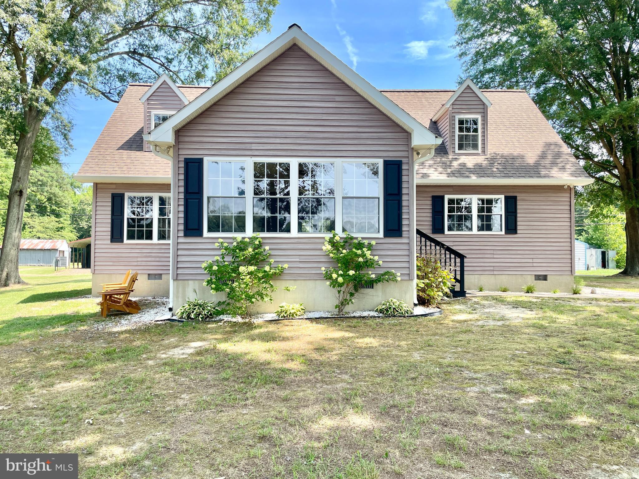 308 Apple Tree Road Montross, VA 22520 - Photo 40 of 55 a front view of a house with a yard