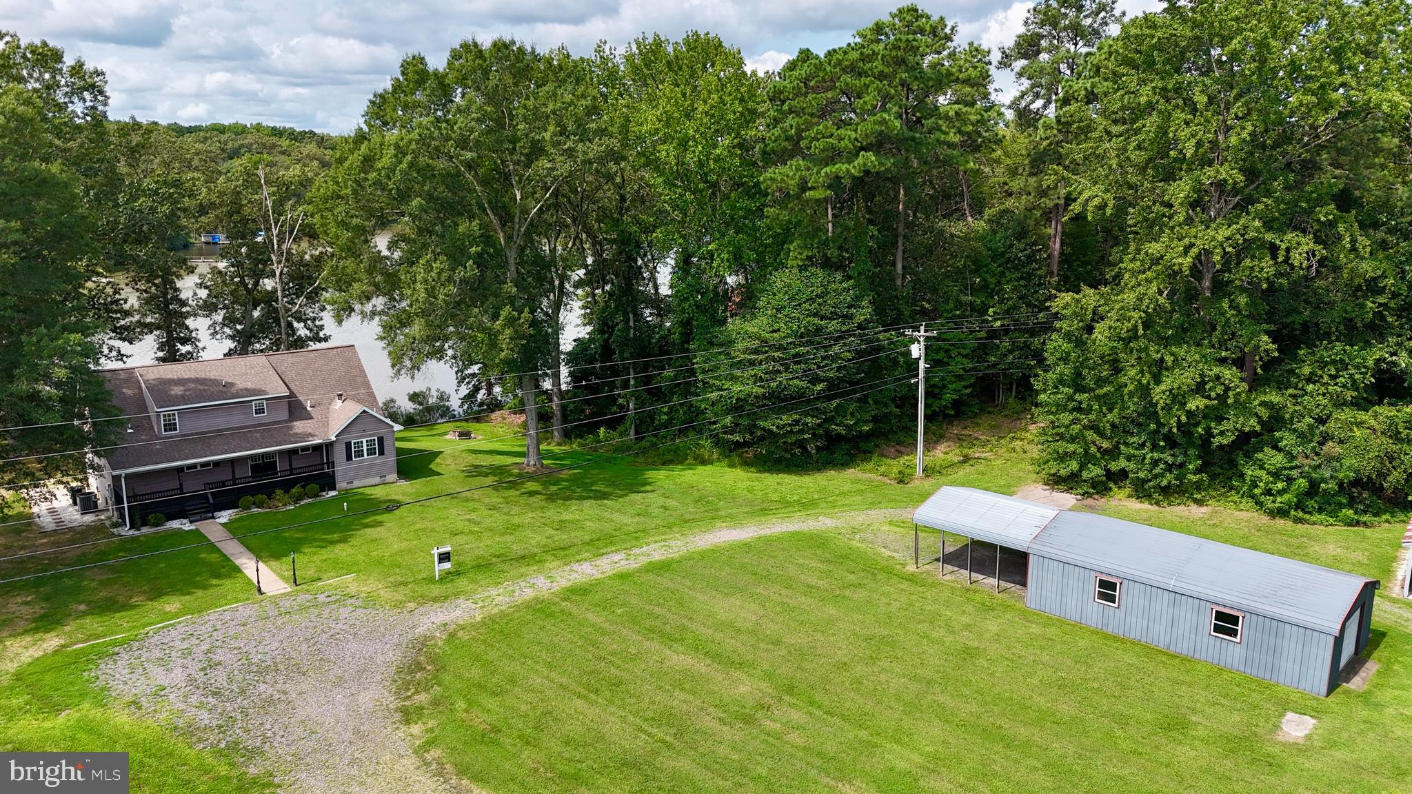 308 Apple Tree Road Montross, VA 22520 - Photo 6 of 55 a view of a backyard with chairs