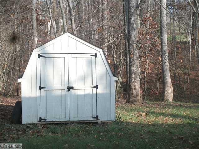 4406 Hunters Run Trinity, NC 27370 - Photo 11 of 15 Outbuilding. Storage barn remains. Perfect for yard tools.