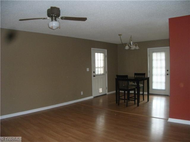 4406 Hunters Run Trinity, NC 27370 - Photo 14 of 15 Living Room. View of dining area/living areas.