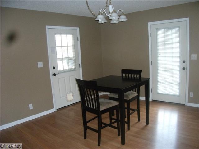4406 Hunters Run Trinity, NC 27370 - Photo 3 of 15 Dining Room. Dining area opens to decking.