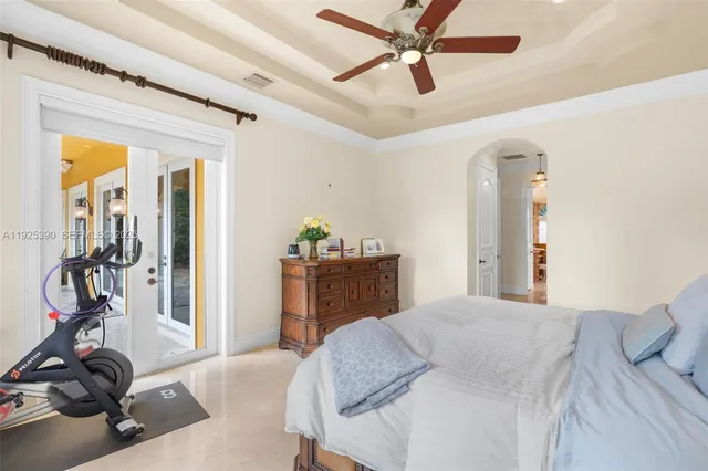 a spacious bathroom with a bathtub and shower
