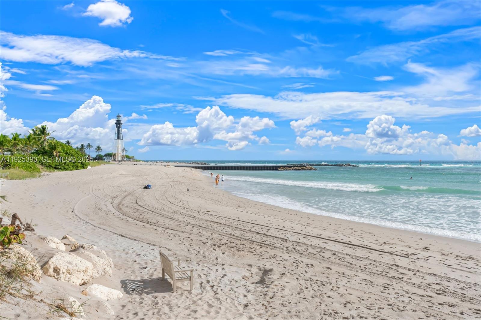 3406 Leigh Road Pompano Beach, FL 33062 - Photo 40 of 49 a view of a lake with a mountain