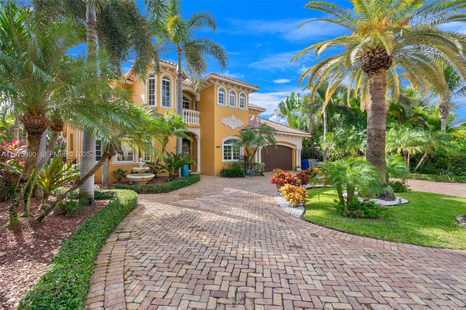 3406 Leigh Road Pompano Beach, FL 33062 - Photo 49 of 49 a front view of a house with garden