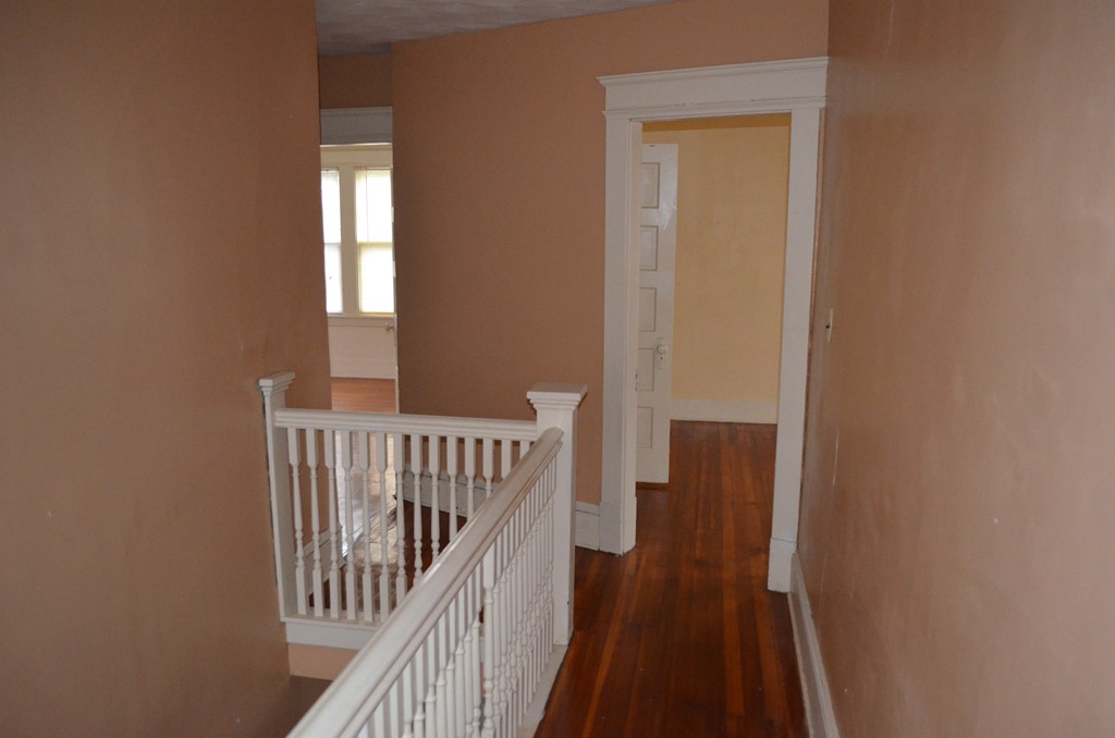 32 Ardmore Street Springfield, MA 01104 - Photo 12 of 17 a view of a balcony with wooden floor
