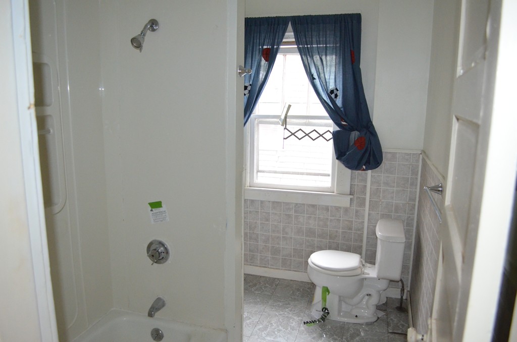 32 Ardmore Street Springfield, MA 01104 - Photo 16 of 17 a bathroom with a toilet and a shower