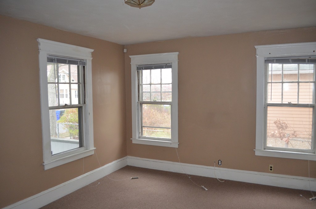 32 Ardmore Street Springfield, MA 01104 - Photo 7 of 17 a view of an empty room with a window