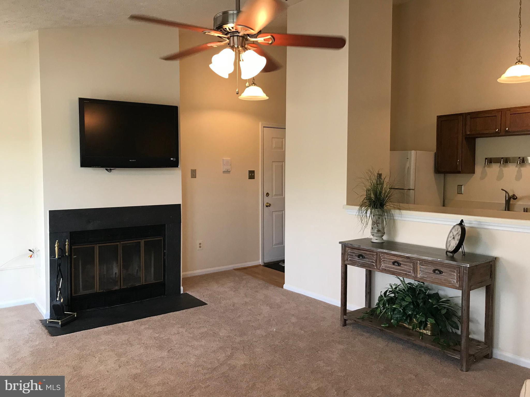 743 Deering Road, Unit 6J Pasadena, MD 21122 - Photo 4 of 26 Romantic Wood burning fireplace