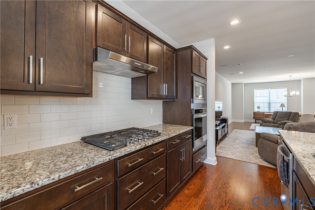 6929 Dunton Road Chesterfield, VA 23832 - Photo 8 of 28 Kitchen featuring granite countertops, dark wood-f