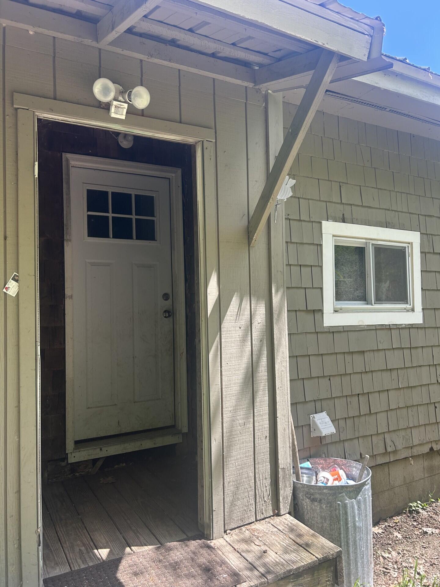 949 Federal Road Livermore, ME 04253 - Photo 3 of 24 0417 rear entry door