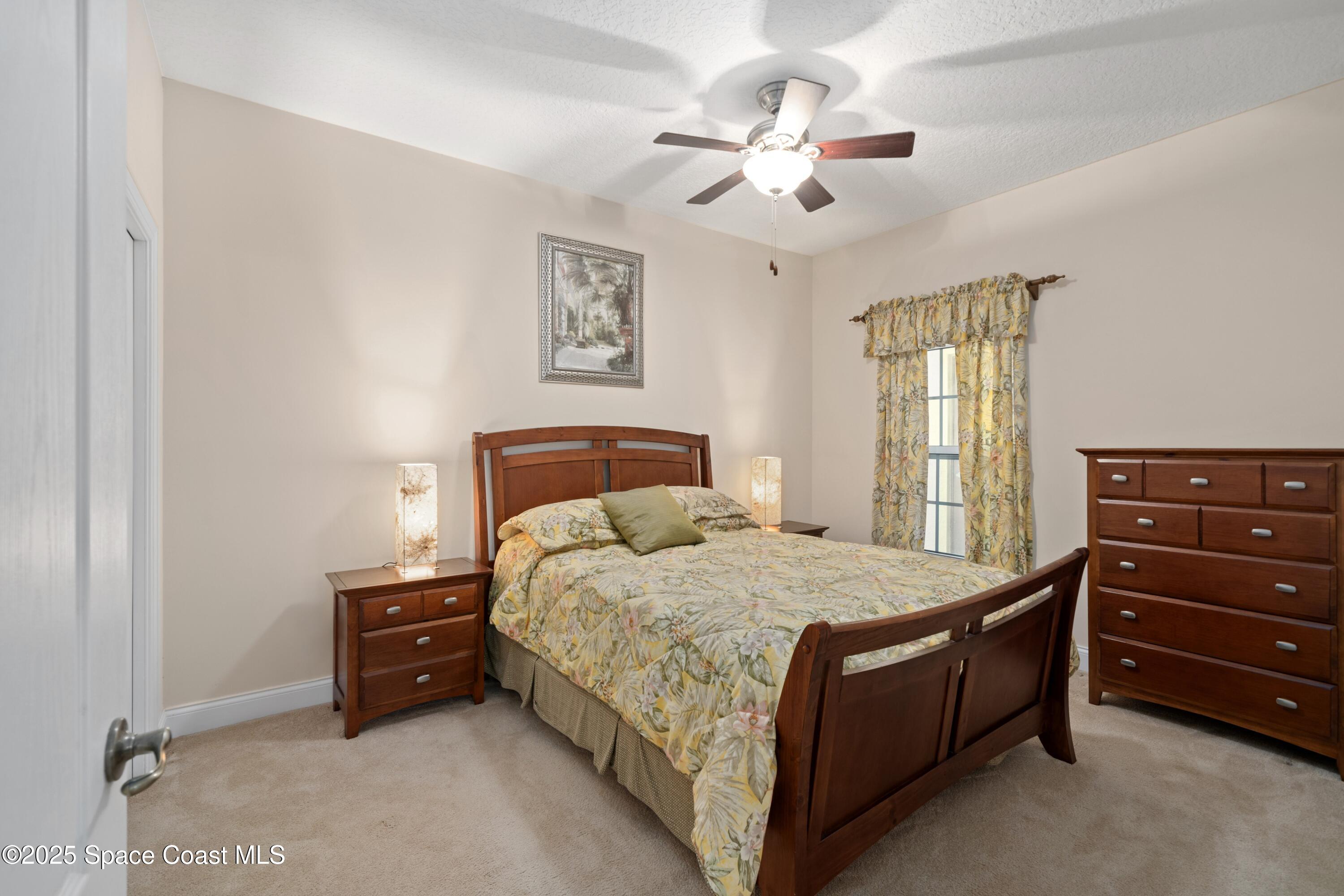 4975 Dixie Highway Northeast, Unit 703 Palm Bay, FL 32905 - Photo 17 of 28 Secondary bedroom 1